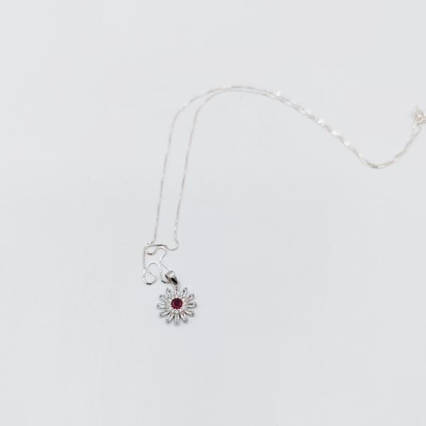 Collar flor punto fucsia
