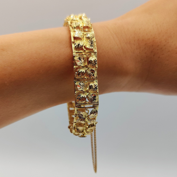 Pulsera Flores de Oro de 18K con Cierre de Cajón y Cordón de Seguridad