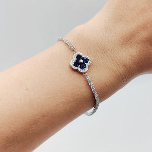 Pulsera de Circonitas con Flor Azul en el Centro