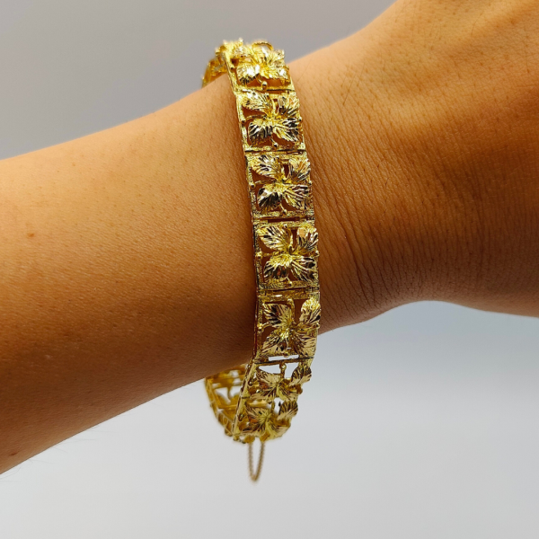 Pulsera Flores de Oro de 18K con Cierre de Cajón y Cordón de Seguridad