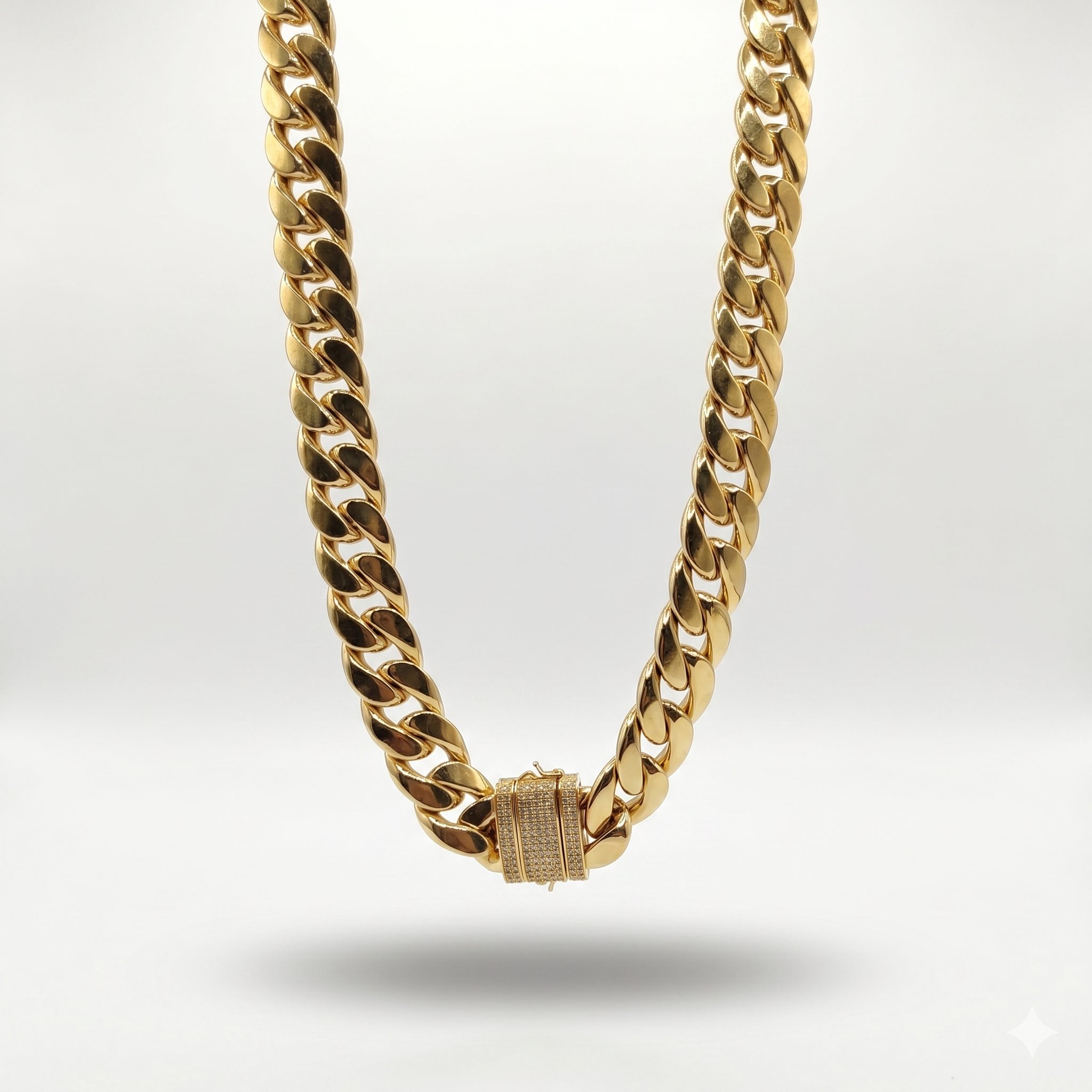 Cadena Cubana con Cierre de Circonitas en Oro 18K – 60 cm y 23 mm