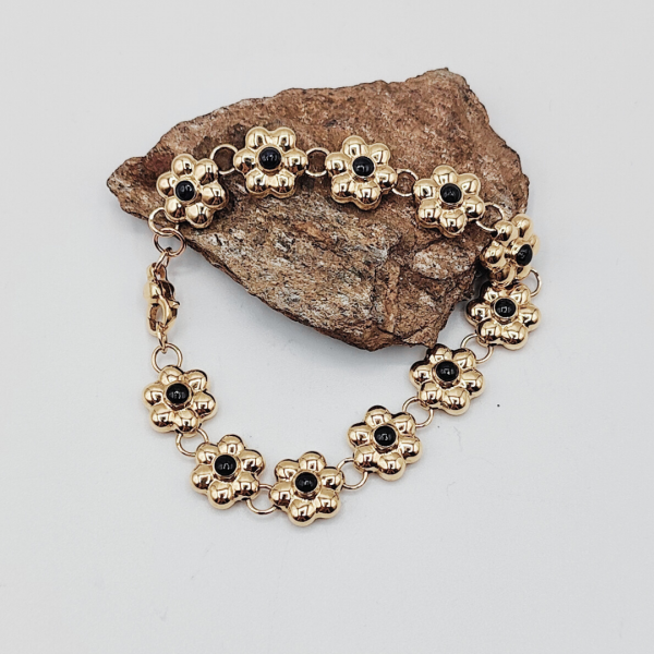 Pulsera flores con el centro en esmalte negro