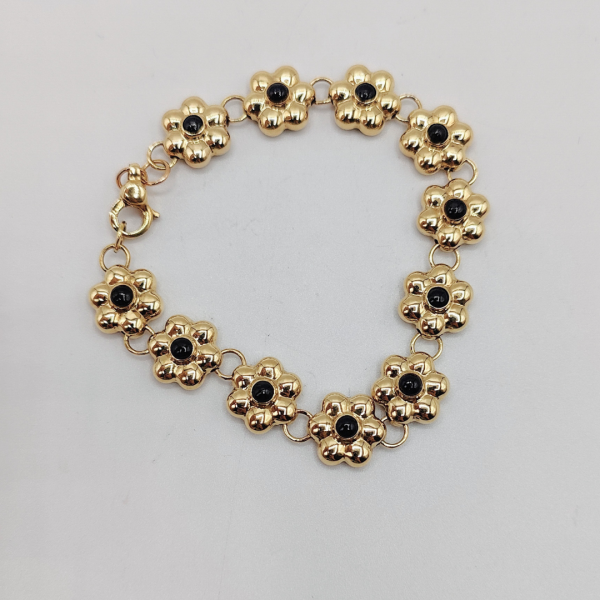 Pulsera flores con el centro en esmalte negro