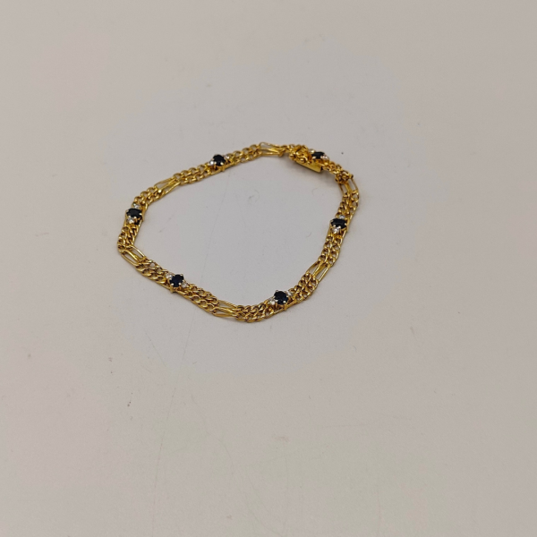 Pulsera doble fígaro unidas por un zafiros y diamantes
