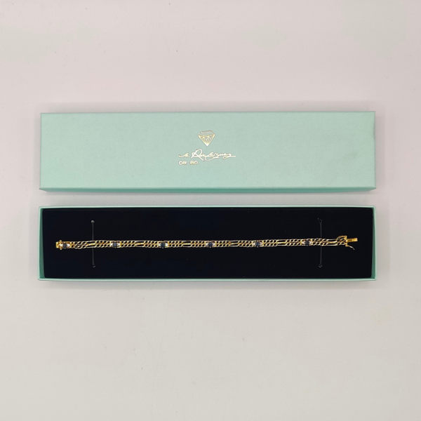 Pulsera doble fígaro unidas por un zafiros y diamantes