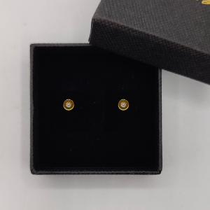 Círculo de Oro de 18K con Circonita Central