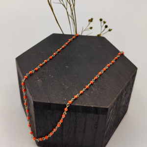 Cadena de plata con bolitas naranja