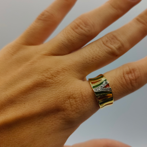 anillo con esmaltado verde y naranja y circonitas oro de 18 k