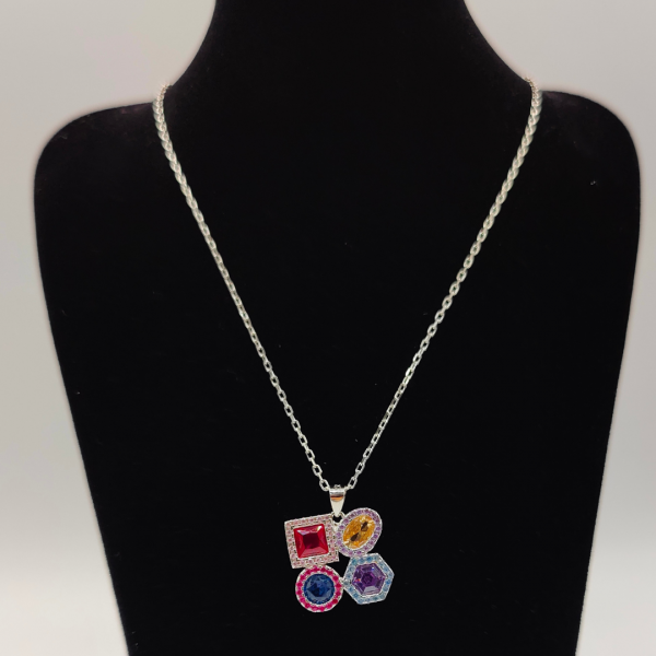 Cadena de plata con colgante con formas geometricas de circonitas de colores