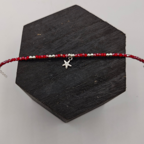 Pulsera de Plata con Bolitas Rojas y Charm de Estrella