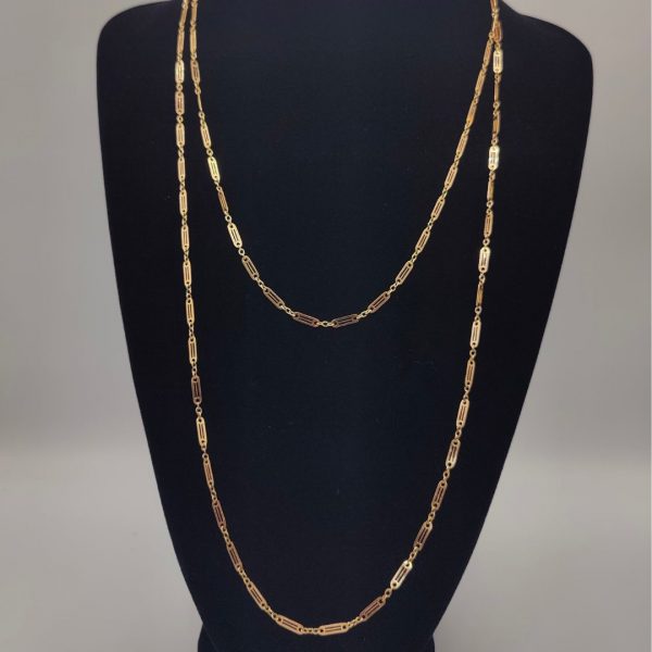 Collar Largo de Oro 18K: Versatilidad y Elegancia en Cada Vuelta