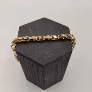 Pulsera rolo con detalles en oro blanco 8 mm