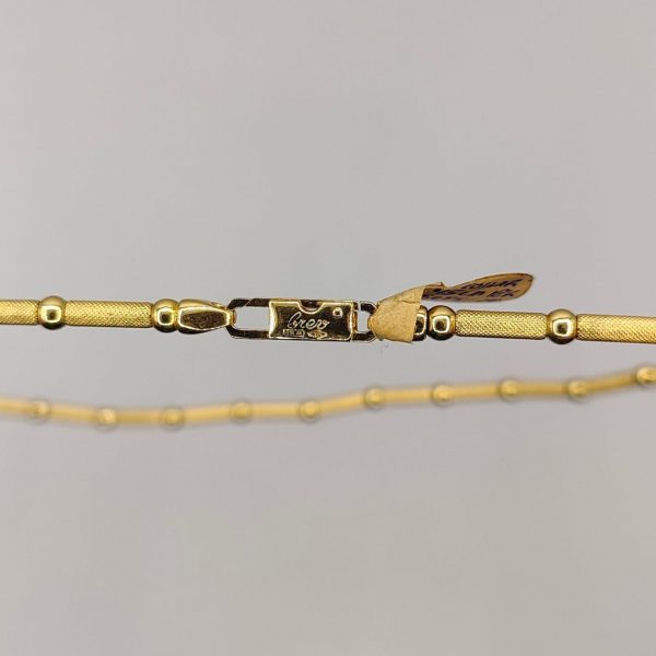 collar 45 cm bolitas marca italiana chini brev