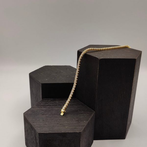 " Pulsera Riviera de Plata Dorada"