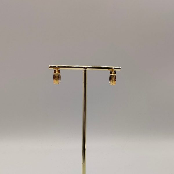 Pendiente aro estilo Versace combinando oro dorado y blanco de 12 mm de diámetro en oro de 18k