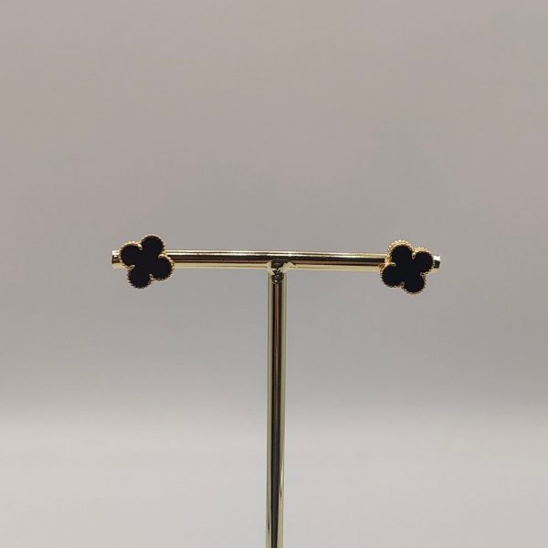 Pendiente flor estilo Van Cleef con ónix negro y oro de 18k