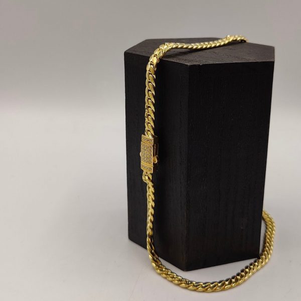 Cadena cubana con cierre de circonita de 51 cm y 6 mm en oro de 18k
