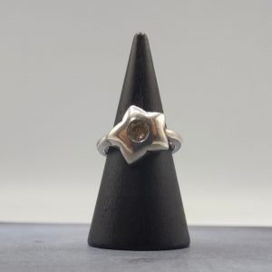 Anillo estrella con circonita en medio extensible