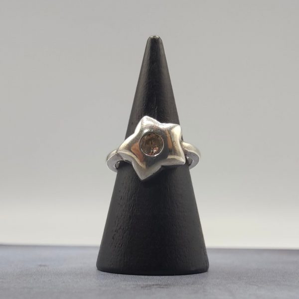 Anillo estrella con circonita en medio extensible