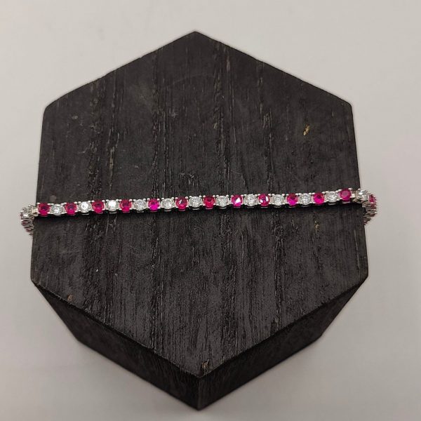 Pulsera de Plata Estilo Riviera con Circonitas Fucsias y Blancas