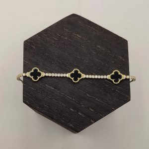 Pulsera de plata estilo riviera con 3 flores önix