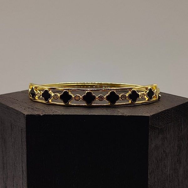 Brazalete flores van cleff en negro intercaladas con circonitas