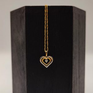 Colgante Corazón Bicolor en Oro 18K con Diamante Central