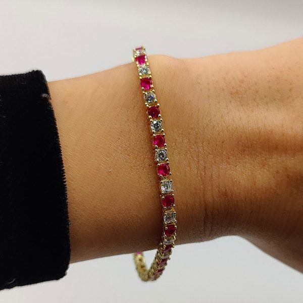 Pulsera de Plata Chapada en Oro Estilo Riviera con Circonitas Fucsias y Blancas