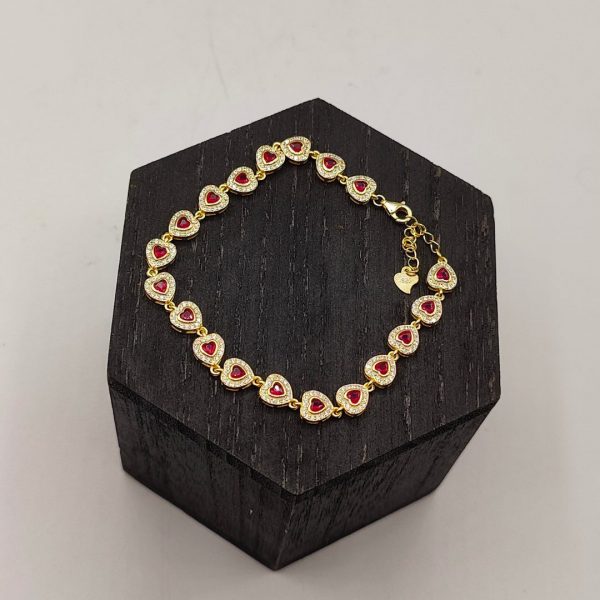 Pulsera corazones relleno de circonitas y circonitas rosas de plata chapana en oro