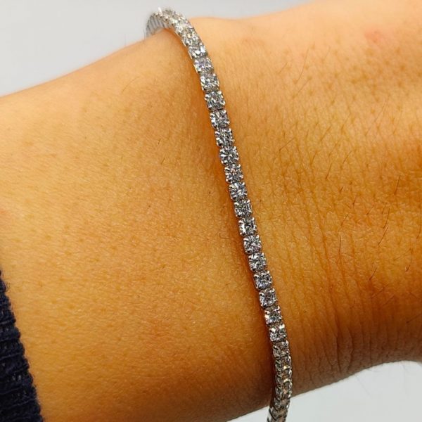 Pulsera de plata chapada en oro riviera con circonitas blanas