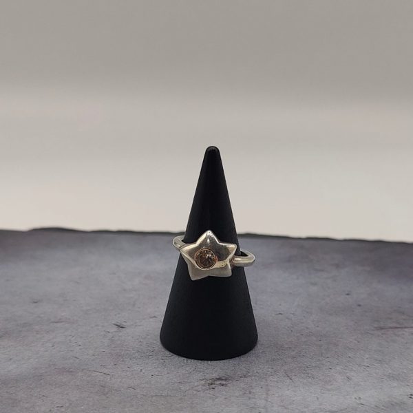 Anillo estrella con circonita en medio extensible