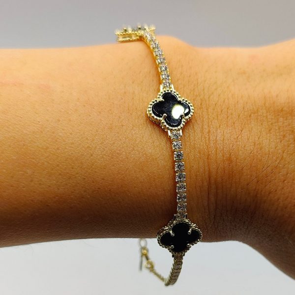 Pulsera de plata estilo riviera con 3 flores önix