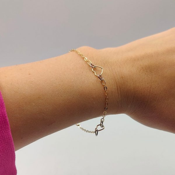 Pulsera Rolo con Corazones Entrelazados de Oro Dorado y Blanco – 18K