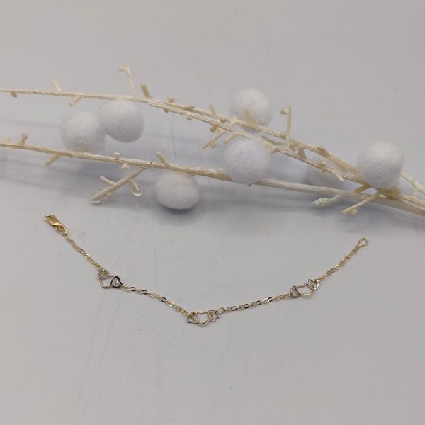 Pulsera Rolo con Corazones Entrelazados de Oro Dorado y Blanco – 18K