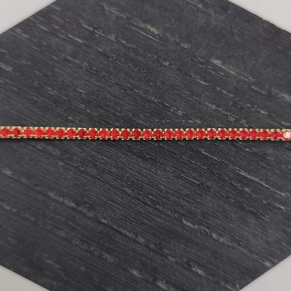 Pulsera Riviera de Plata Dorada con Circonitas Rojas