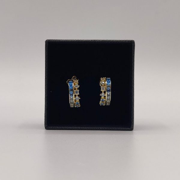 Pendientes semi aro doble con circonitas en tonos azules