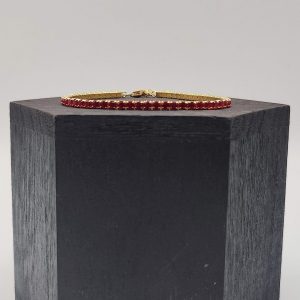 Pulsera Riviera de Plata Dorada con Circonitas Rojas