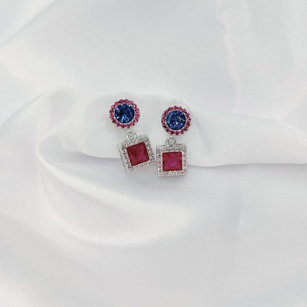 Pendientes colgantes de plata dorada con circonitas azul noche y rosas