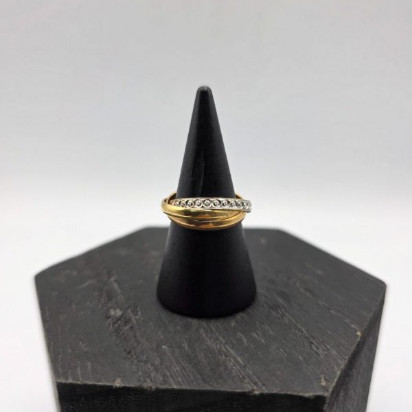 Anillo Triple Entrelazado en Oro 18K con Circonitas