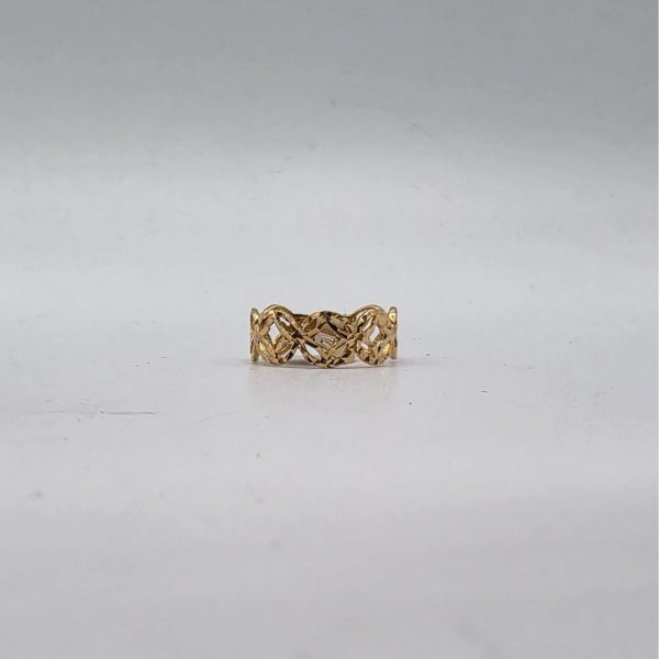 Anillo con Dibujos Trocados en Oro de 18K