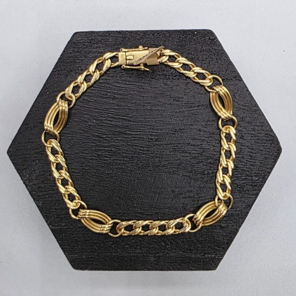 Pulsera Figaro Efecto Triple con Cierre Cajón de 20 cm y 7 mm en Oro de 18k