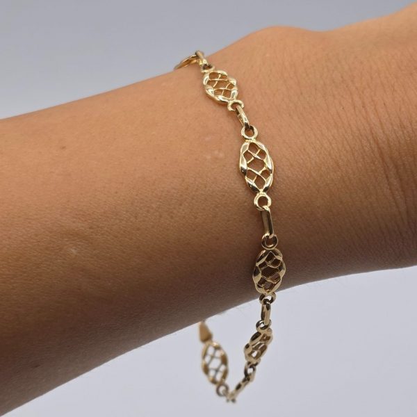 Pulsera con Eslabones y Dibujos Calados de 19,5 cm y 6 mm en Oro de 18K