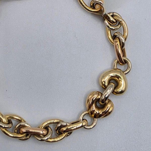 Pulsera de Corazones Entrelazados en Forma de Rolo con Mezcla de Oro Dorado y Rosado (19,5 cm y 11 mm) en Oro de 18K