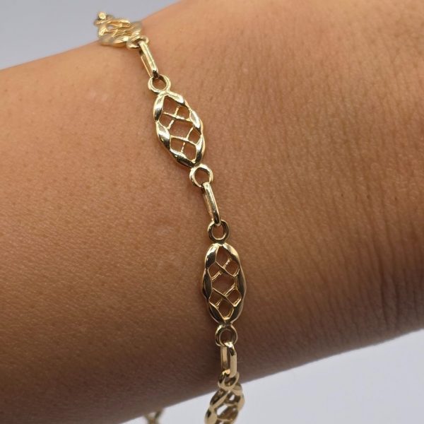 Pulsera con Eslabones y Dibujos Calados de 19,5 cm y 6 mm en Oro de 18K