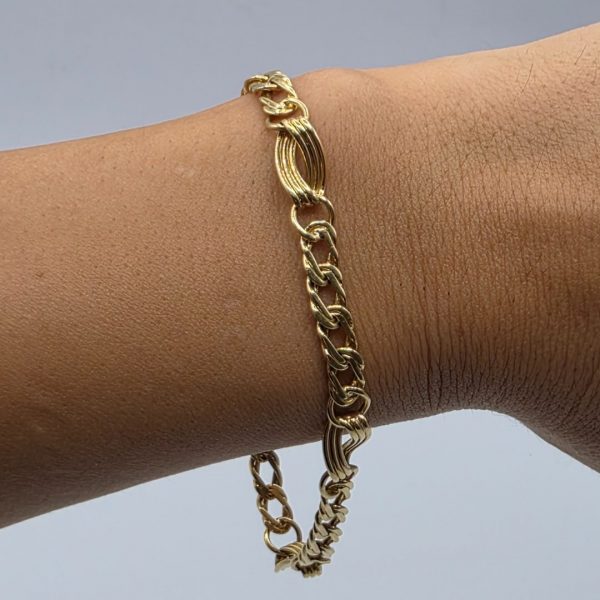 Pulsera Figaro Efecto Triple con Cierre Cajón de 20 cm y 7 mm en Oro de 18k