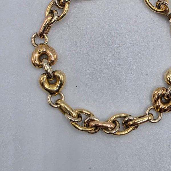 Pulsera de Corazones Entrelazados en Forma de Rolo con Mezcla de Oro Dorado y Rosado (19,5 cm y 11 mm) en Oro de 18K
