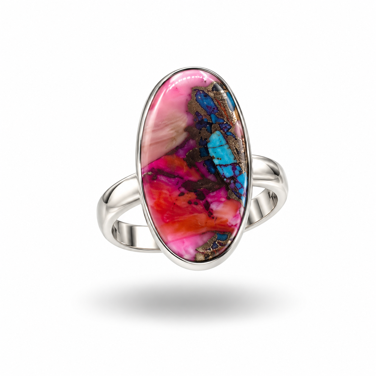 Anillo de plata de ley 925 con piedra de turquesa rosa compuesta, incrustaciones de cobre y destellos azules.